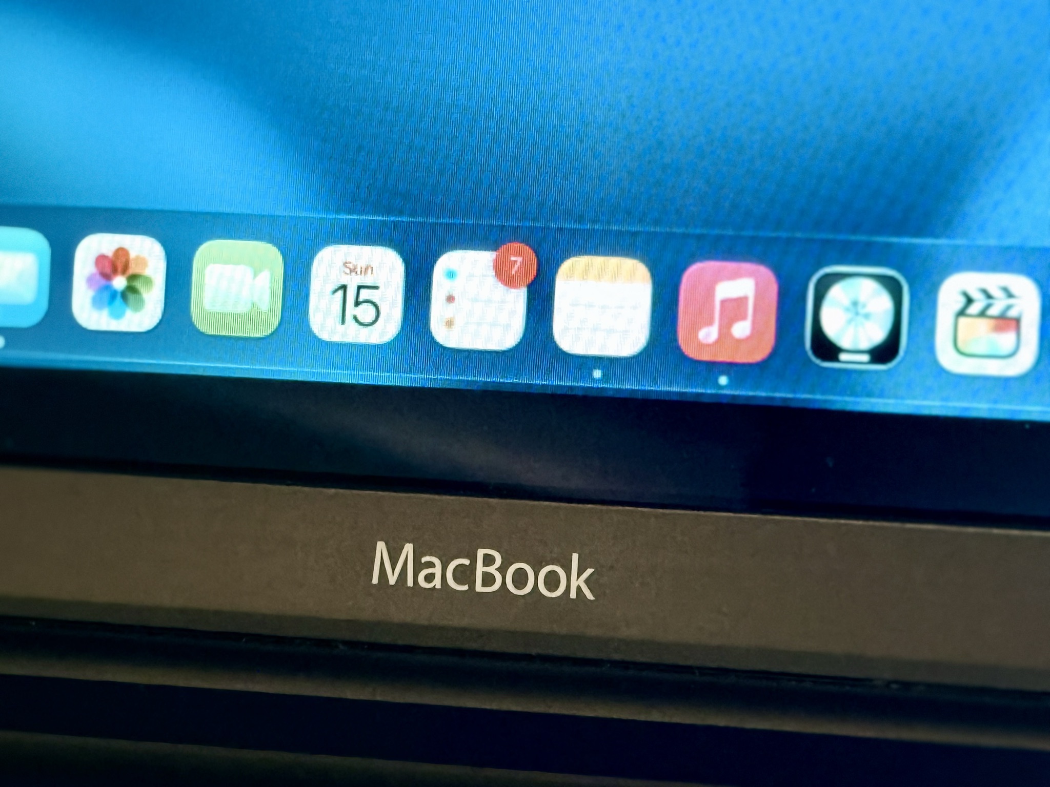 The MacBook running macOS Sequoia via remote desktop